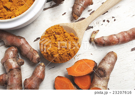 Roots and powder turmeric Roots and powder turmeric 23207616
