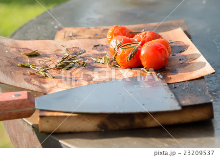tomatoes on the grill pan  the table 23209537