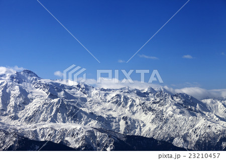 View on snowy mountains at nice sunny day 23210457