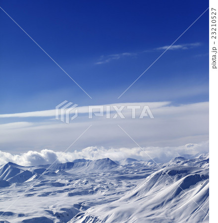 View from ski resort on snowy mountains View from ski resort on snowy mountains 23210527