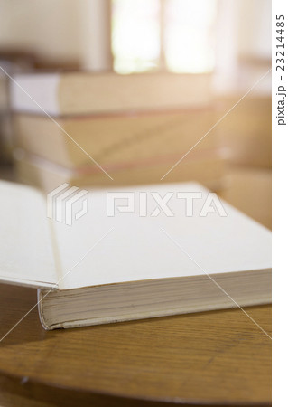 old book with blur library background 23214485