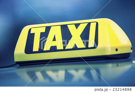 Taxi car waiting passengers in town.Taxi light  23214898