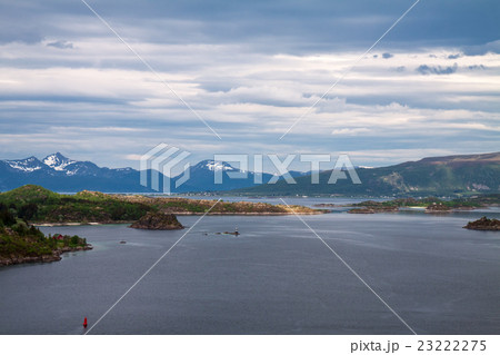 scenic view of fjord and snow mountains, Norway 23222275