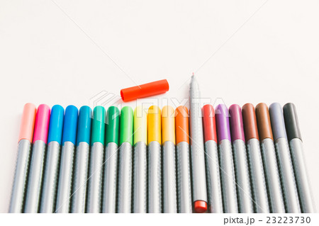 Red pen, rainbow magic colour pen on white paper 23223730