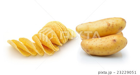 Potato chips and potato isolated Potato chips and potato isolated 23229051