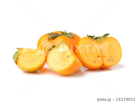 ripe persimmons isolated on white background 23229052