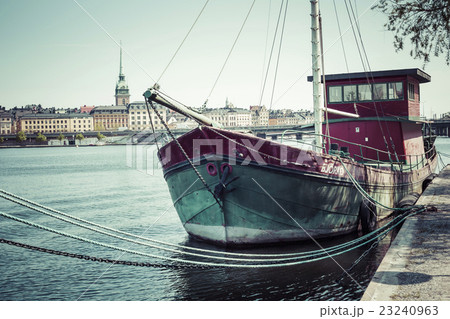 Old city buildings and old boats, Stockholm,Sweden 23240963