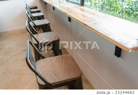 Tables and chairs in restaurant . Tables and chairs in restaurant . 23244662
