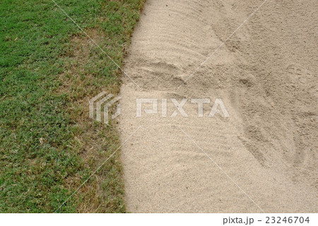 Sand bunker in golf course 23246704