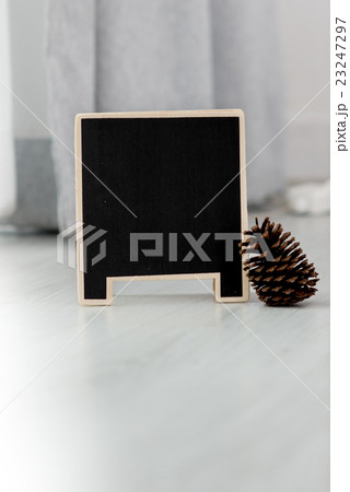 Small wooden framed blank blackboard over a window Small wooden framed blank blackboard over a window 23247297