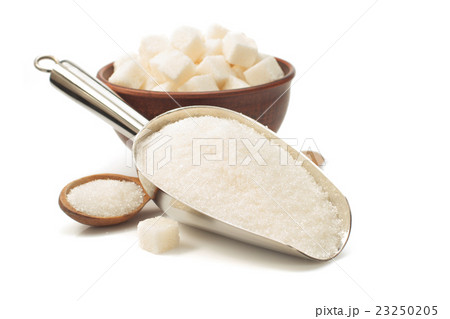 granulated sugar in scoop on white 23250205