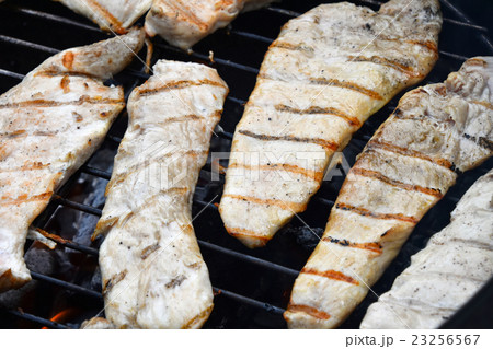 Chicken or turkey steak ready cooked on grill 23256567