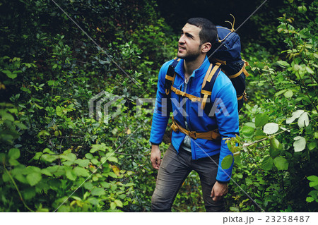 Traveler hike in the mountains in summer Traveler hike in the mountains in summer 23258487