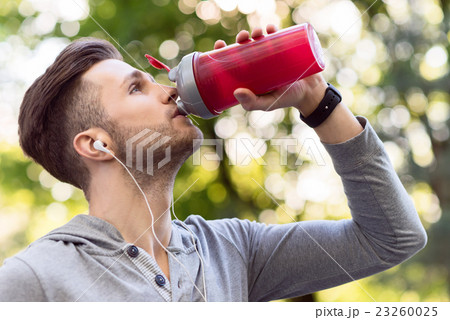 Athlete making break after training 23260025