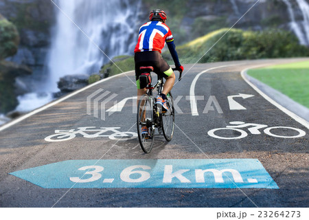 Road sign bicycle lane and  biker riding 23264273