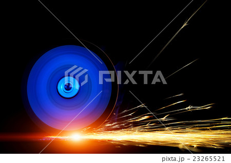 Worker cutting metal with grinder 23265521