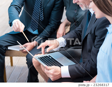 Pleasant colleagues working on the project 23268317