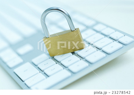 Security lock on white computer keyboard 23278542