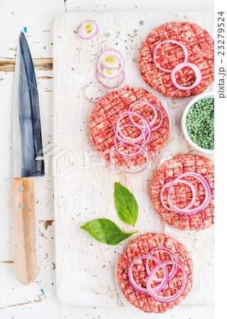 Raw ground beef meat cutlet for making burgers Raw ground beef meat cutlet for making burgers 23279524