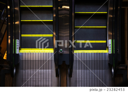 Escalator closeup, mall interior, low light Escalator closeup, mall interior, low light 23282453