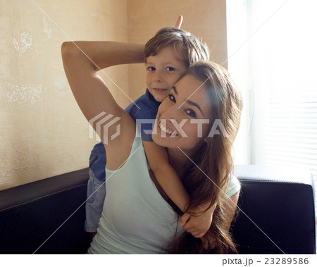 mother with son, happy family at home 23289586