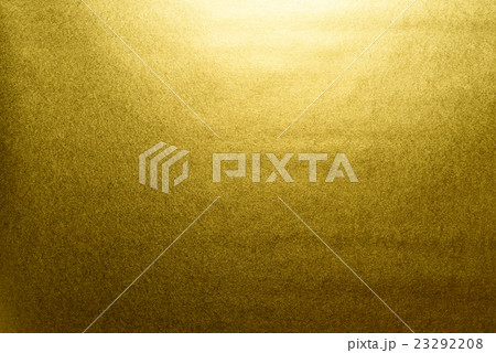 金色の紙 背景画像 光上から位置右の写真素材