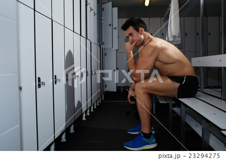 Young sportsman is resting after hard training 23294275