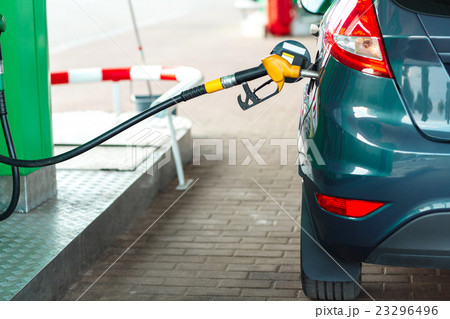 Car refueling on a petrol station 23296496