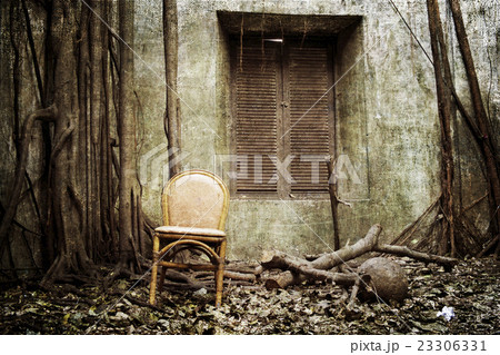 the old windows, the root and the old chair 23306331