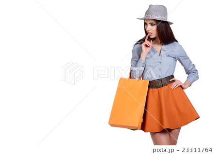 Fashion woman with shopping bags. Studio shoot Fashion woman with shopping bags. Studio shoot 23311764