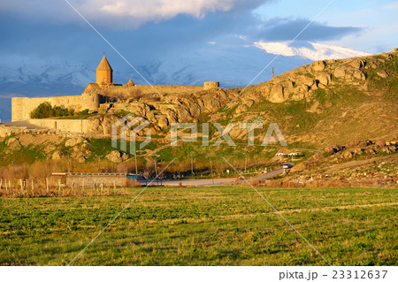 Ancient monastery in front of mountain 23312637