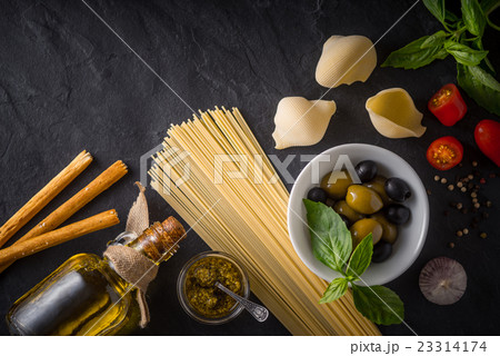 Set of Italian food on the black stone table 23314174