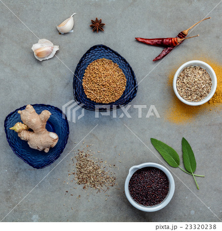 Assorted of spices set up on stone background. Assorted of spices set up on stone background. 23320238