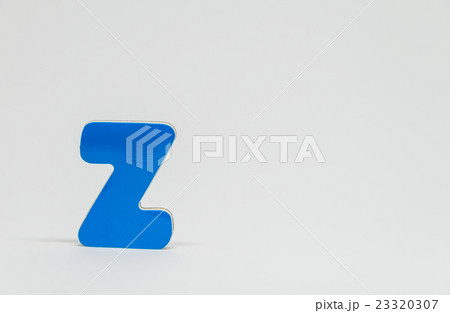 Blue wooden alphabet Z with white background Blue wooden alphabet Z with white background 23320307