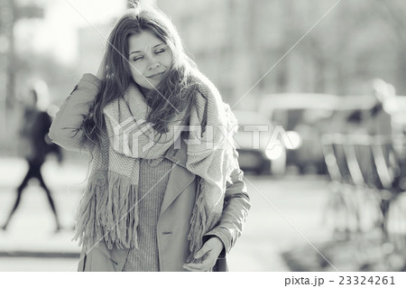 Urban portrait of a girl in bright colors 23324261