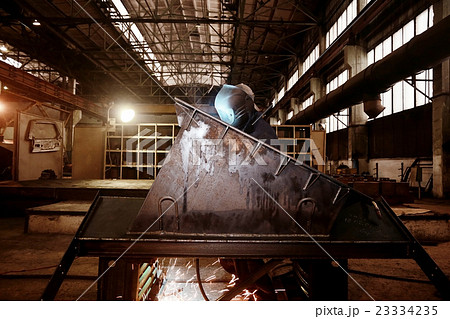 welder working at the factory 23334235