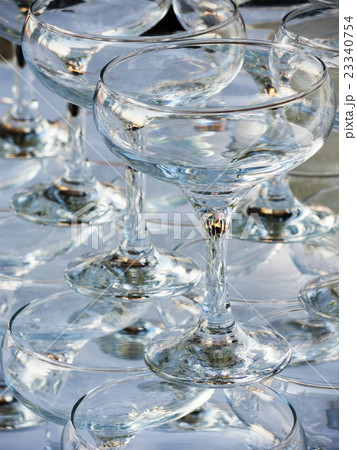 Stack of empty wine glasses 23340754