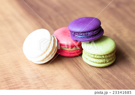 Colorful French Macarons on wooden background. 23341685