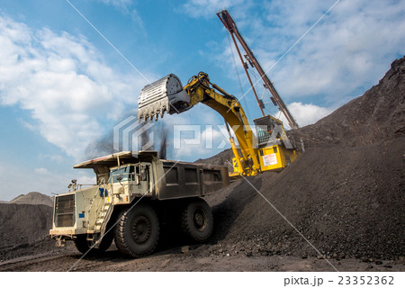 Excavator at work in open pit 23352362