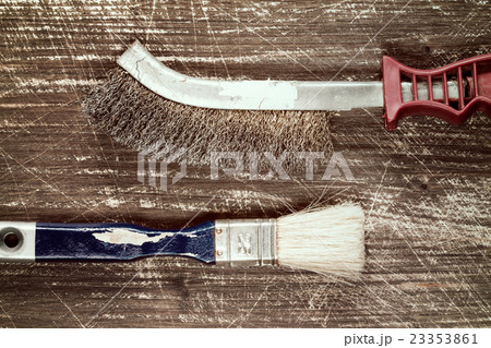 Wire brush and paintbrush 23353861