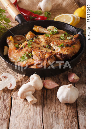 Chicken tobacco with vegetables close-up 23356049