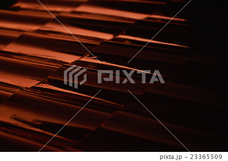 Abstract closeup metal profile roof-tile at sunset Abstract closeup metal profile roof-tile at sunset 23365509