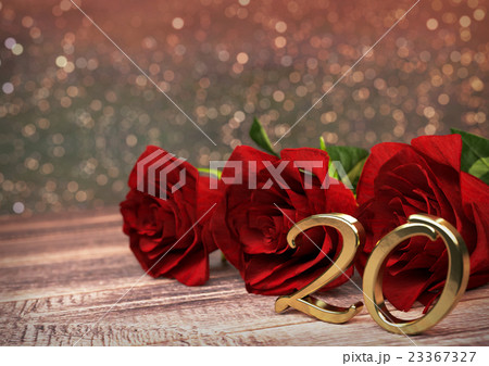 birthday concept with red roses on wooden desk 23367327