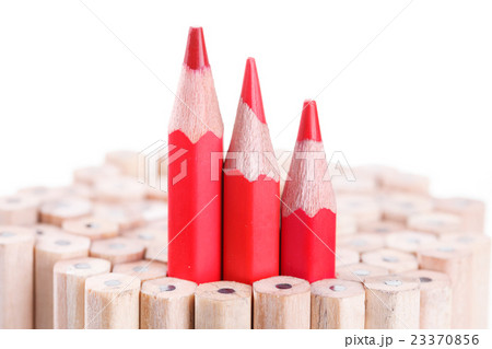 three sharpened red pencil among many ones 23370856
