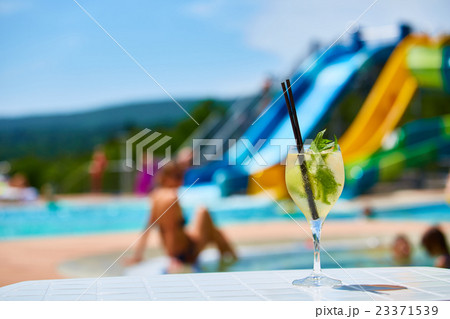 Close up Cocktail margaritas with lime near the 23371539