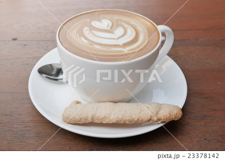 latte art coffee with heart pattern in a white cup 23378142