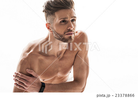 Young male athlete feels pain in shoulder 23378866