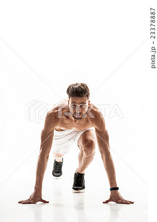 Cheerful male runner preparing to jog 23378887