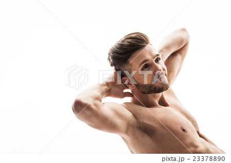 Attractive sportsman exercising with joy Attractive sportsman exercising with joy 23378890
