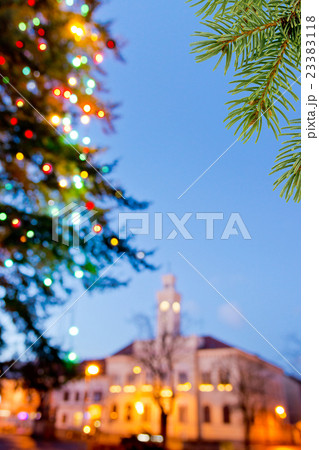 Christmas twig with christmas tree in the town Christmas twig with christmas tree in the town 23383118